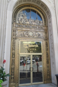 First National Bank Building door in Davenport, Iowa; constructed in 1923 to a design by Frank A. Childs and William Jones Smith. The door is influenced by the Italian Renaissance and the metal compositions in the Rejas of the Spanish Renaissance